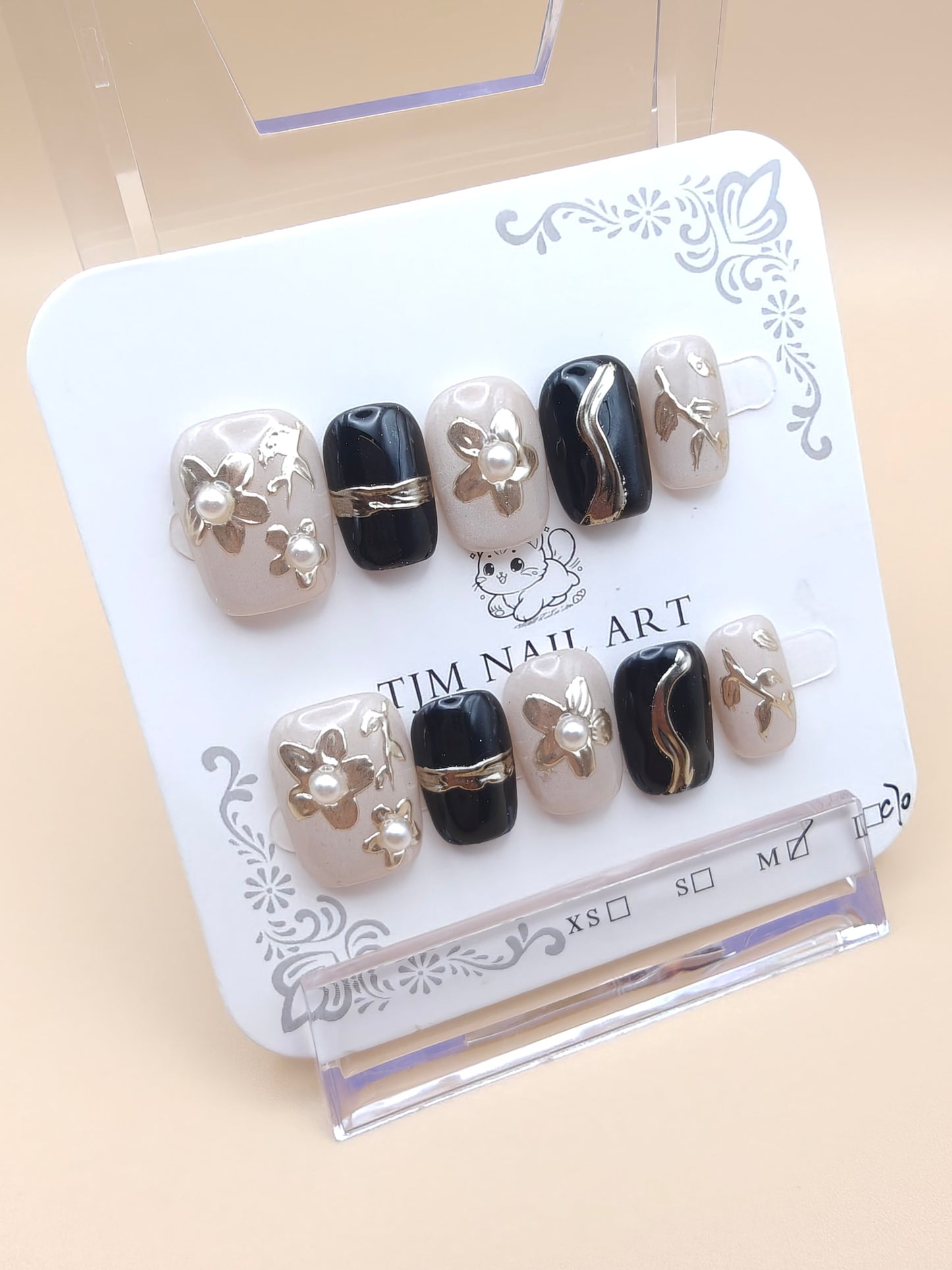 A- Gold/Black floral & pearls Nails