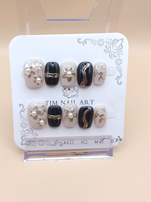 A- Gold/Black floral & pearls Nails