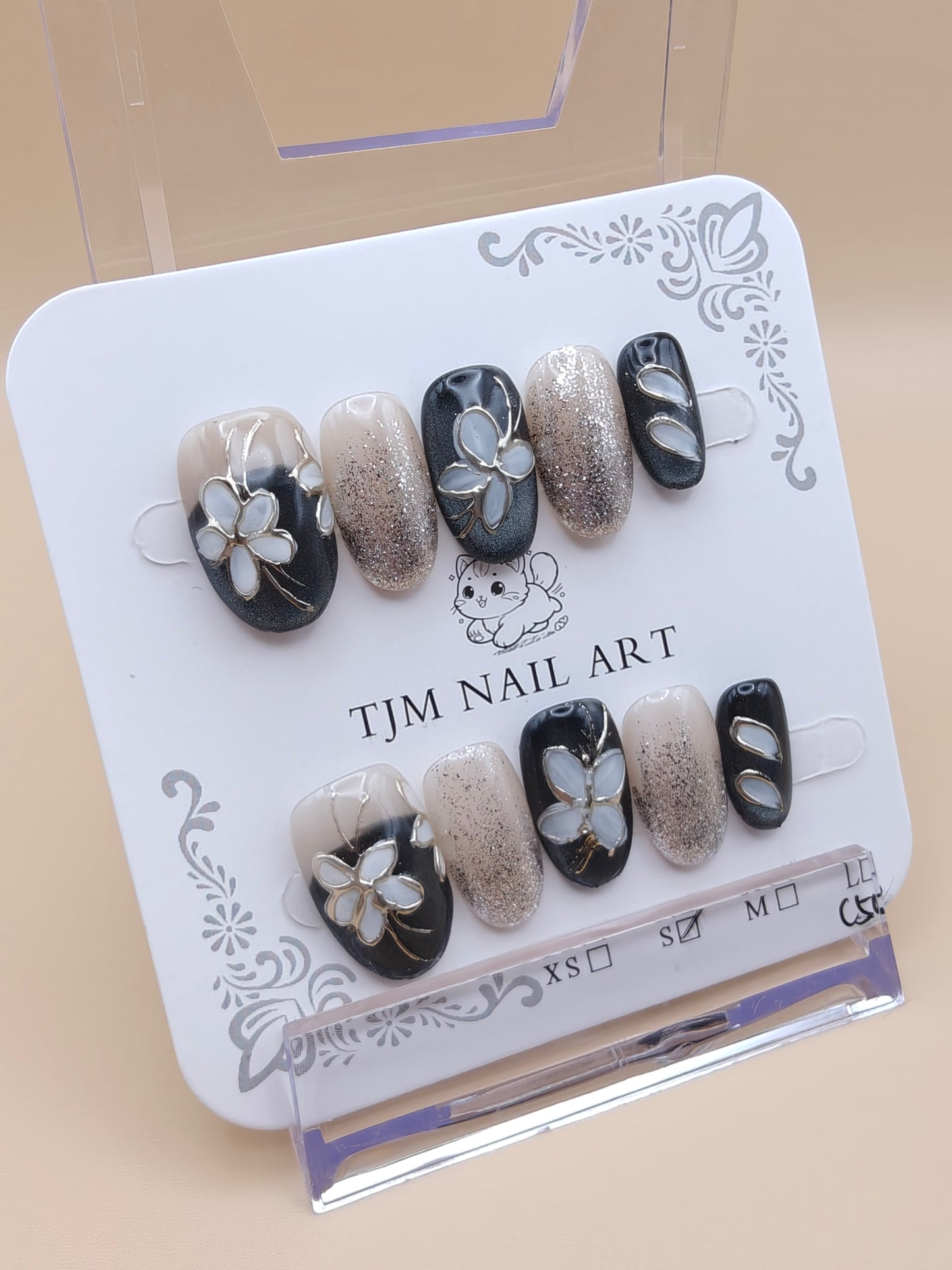 A- Gray/cream floral glitter Nails